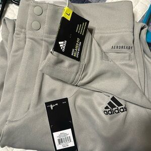 Baseball pants. Never worn.  Solid grey.